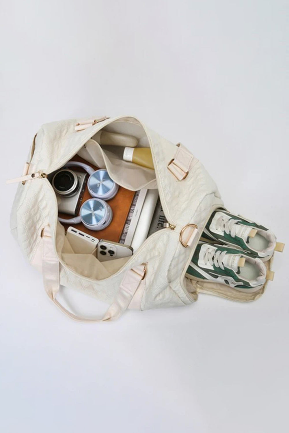 Bolsa de viaje impermeable con textura de rombo negro y blanca