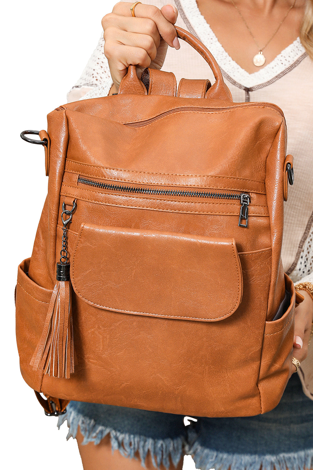Mochila retro de gran capacidad de PU con decoración de borlas marrones.