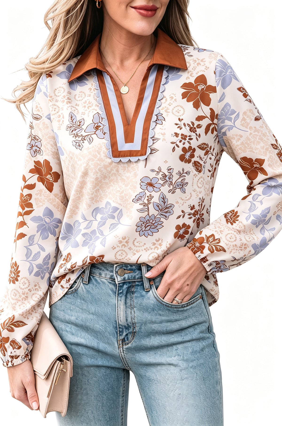Blusa blanca de manga larga con cuello en V y bloques de color con estampado floral.