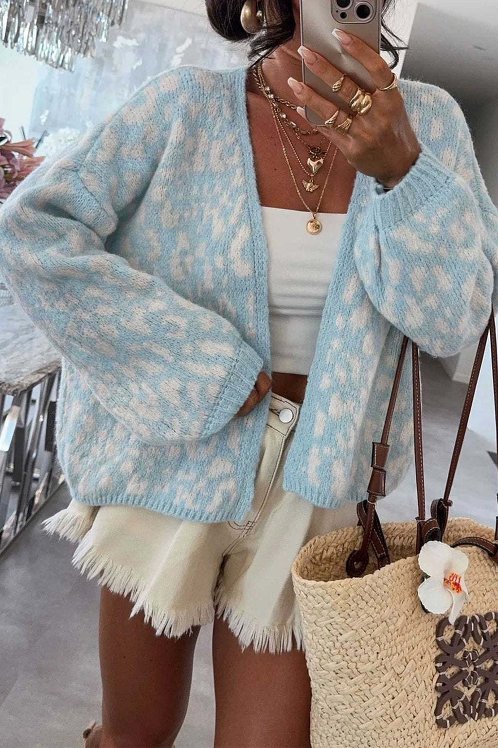 Cárdigan de punto holgado de manga larga con cuello en V y estampado de leopardo azul claro
