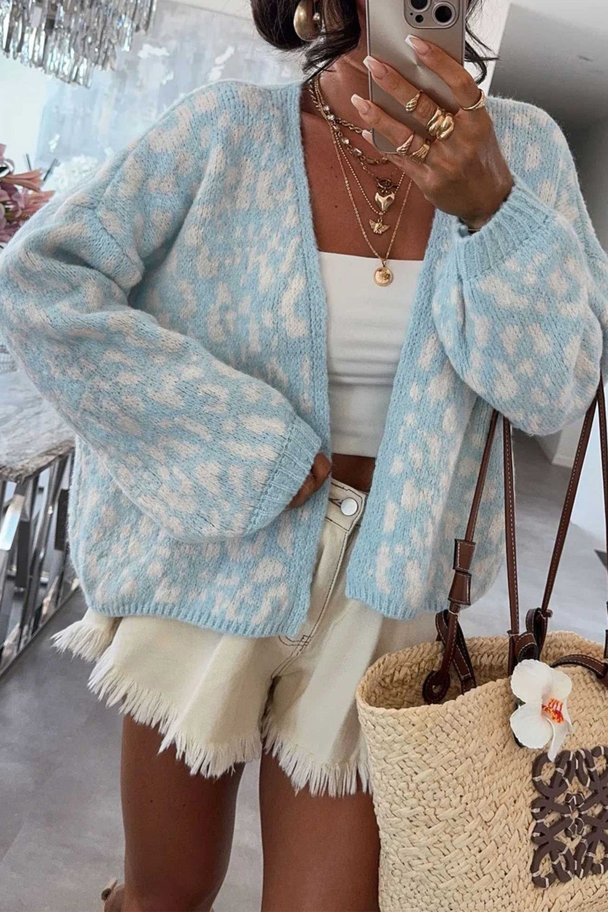 Cárdigan de punto holgado de manga larga con cuello en V y estampado de leopardo azul claro