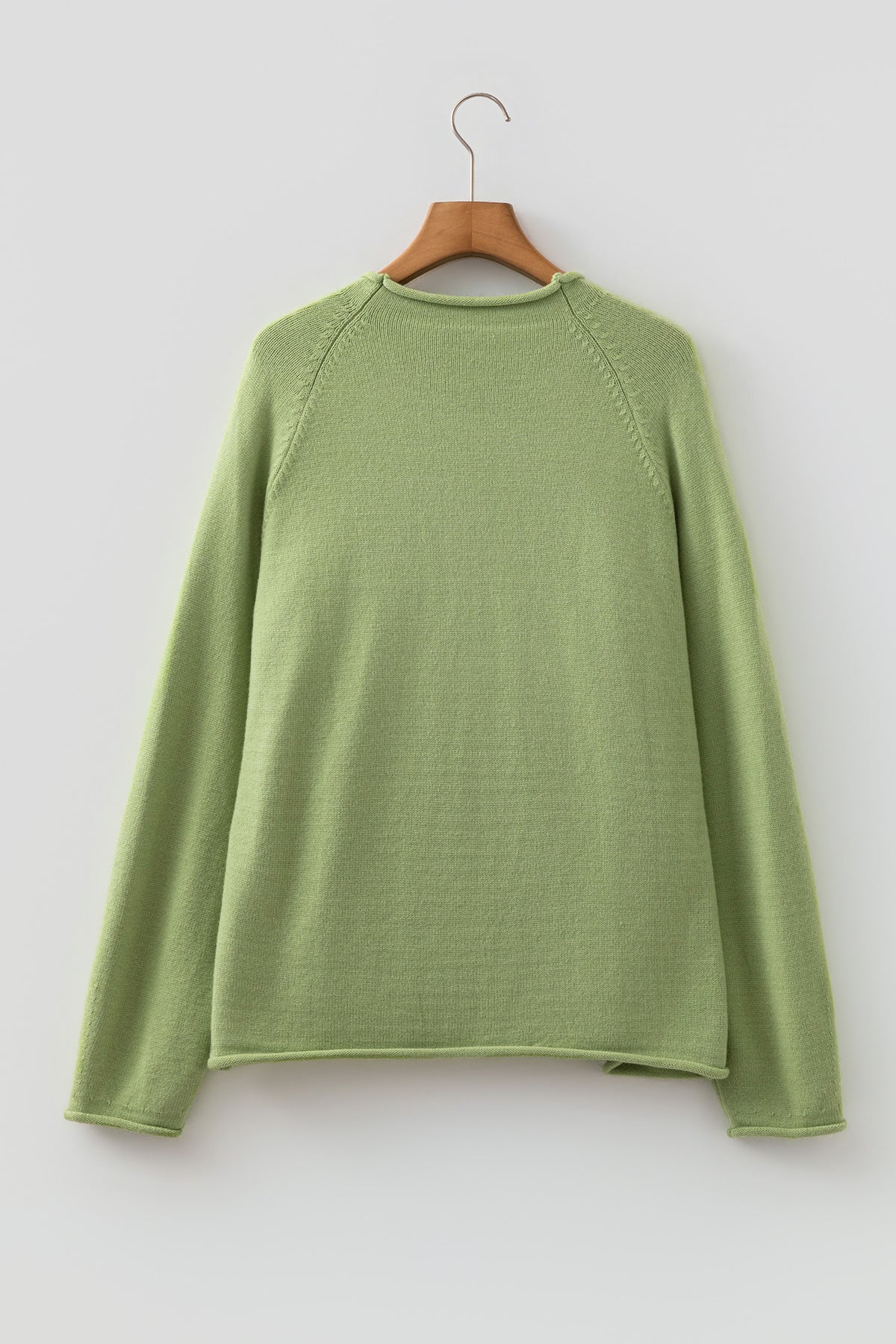 Suéter de cuello redondo extragrande único de punto con diseño de pez en color verde niebla de pradera.