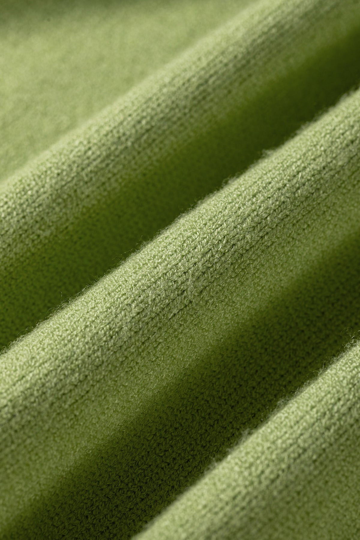Suéter de cuello redondo extragrande único de punto con diseño de pez en color verde niebla de pradera.