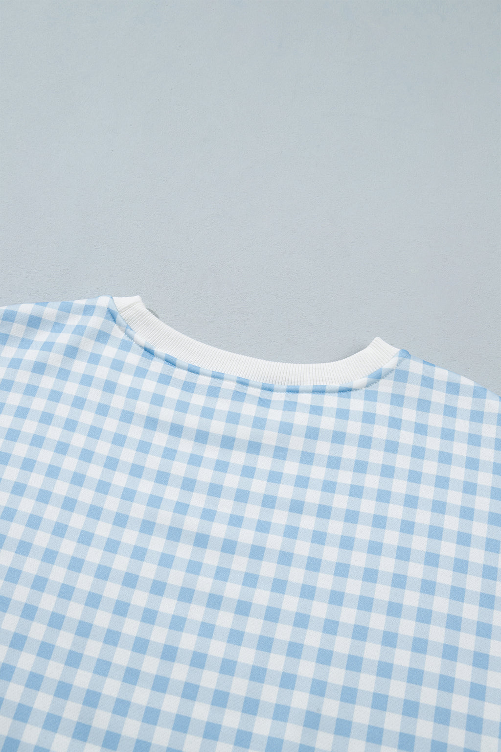 Conjunto de 2 piezas: jersey holgado de cuadros azul cielo con cordón ajustable y shorts casuales.