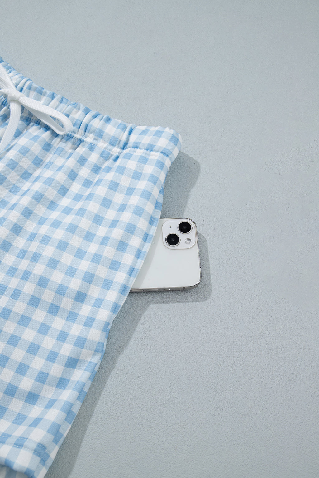 Conjunto de 2 piezas: jersey holgado de cuadros azul cielo con cordón ajustable y shorts casuales.