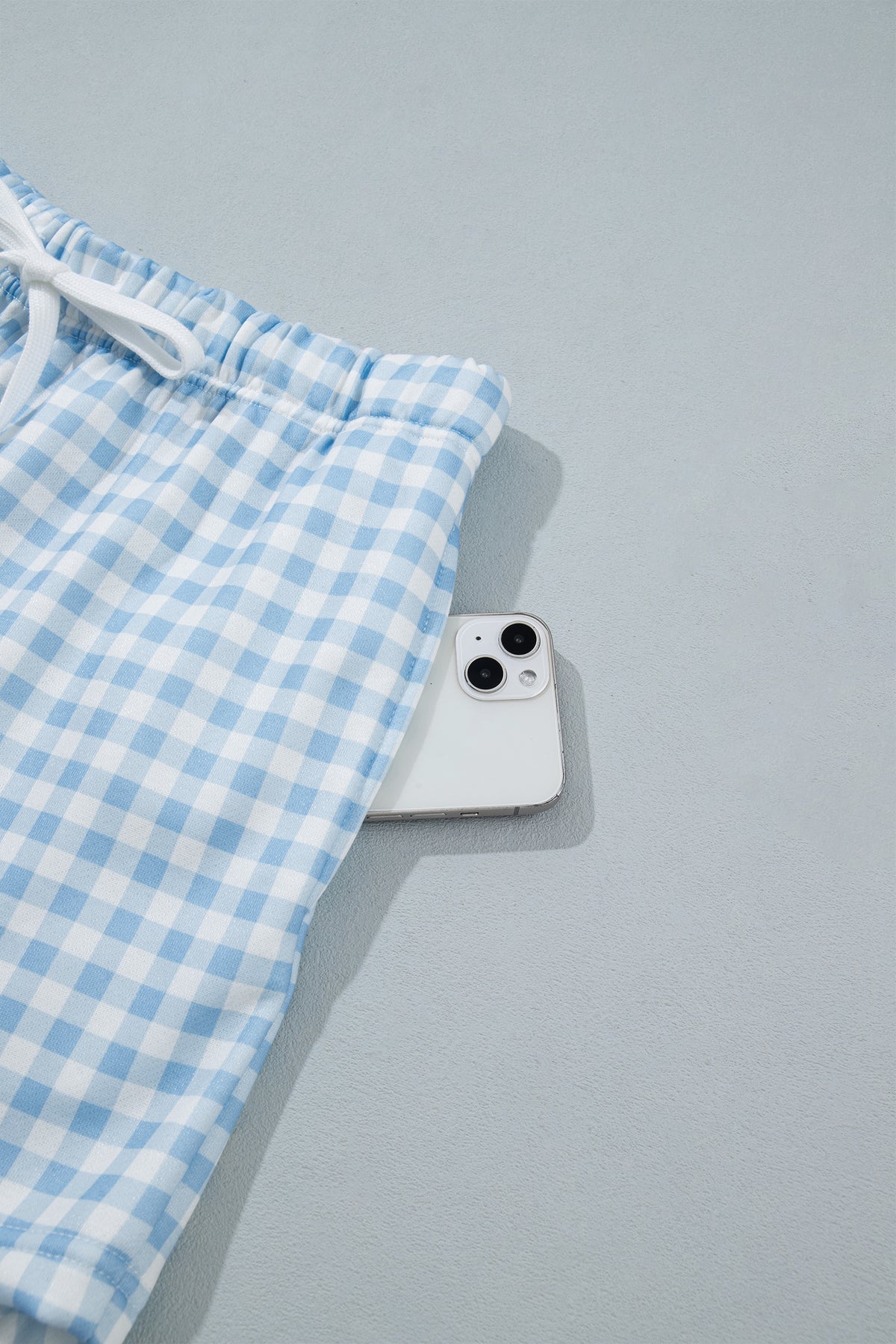 Conjunto de 2 piezas: jersey holgado de cuadros azul cielo con cordón ajustable y shorts casuales.