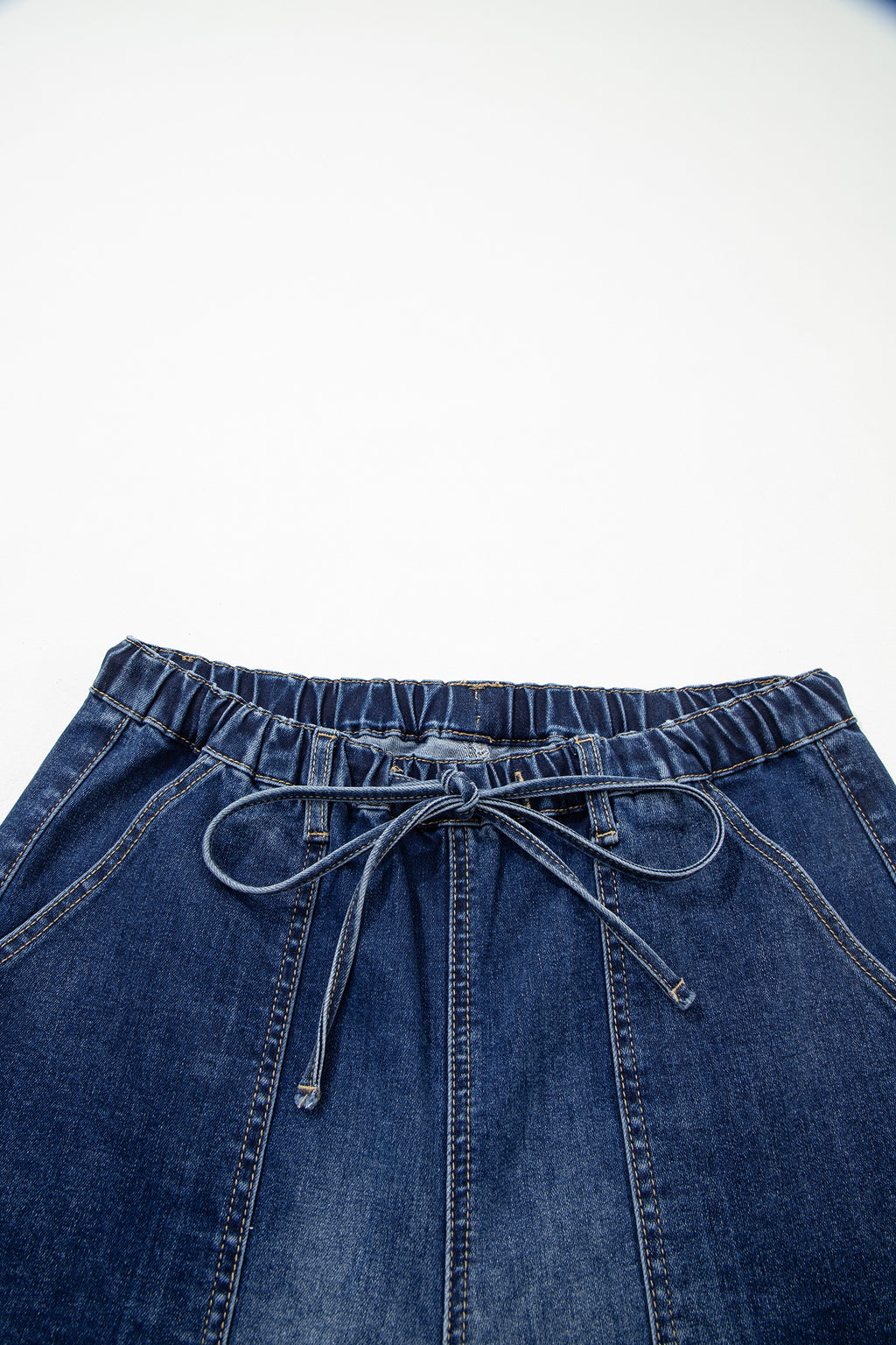 Pantalones vaqueros de pierna ancha con detalle de cordón