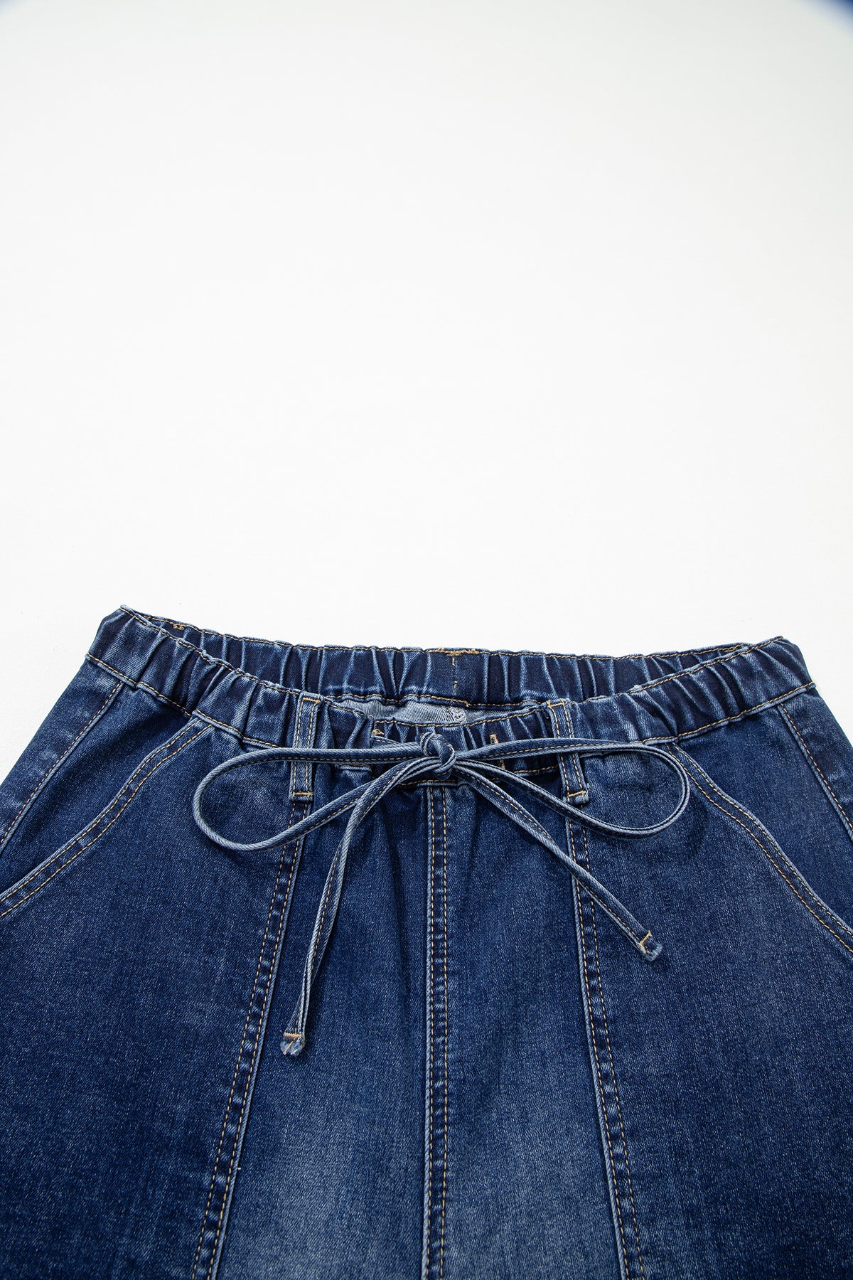 Pantalones vaqueros de pierna ancha con detalle de cordón